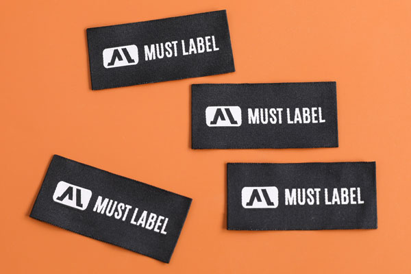Label merek dagang tenun
